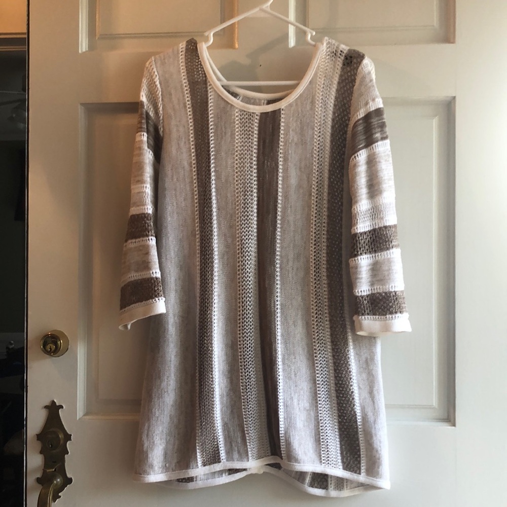 White and tan sweater
